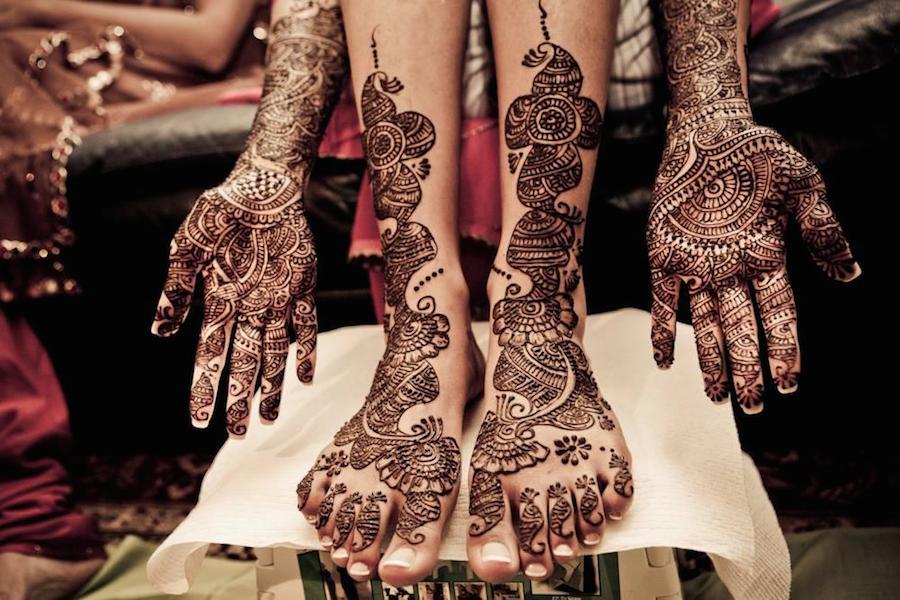 Mehndi tattoos on hands and feet